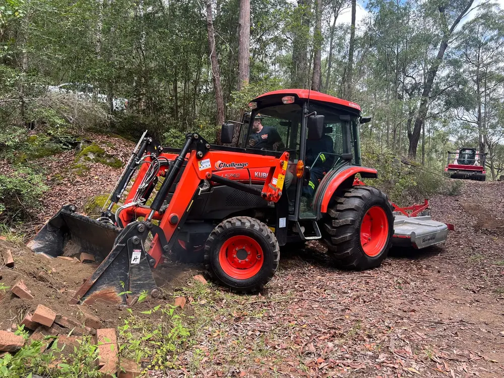 Tractor and slasher plant reducing fuel loads mechanically.
